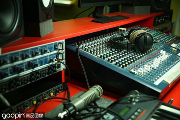 headphones on a mixer in a music recording studio close up